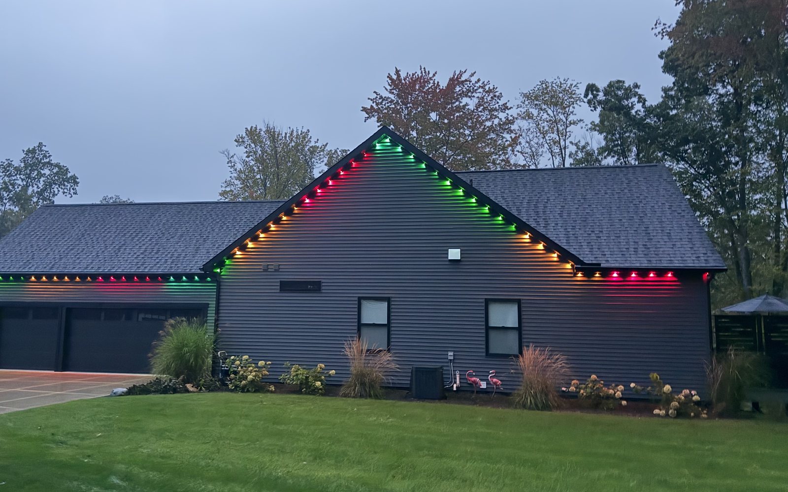 The same home lit in red and green