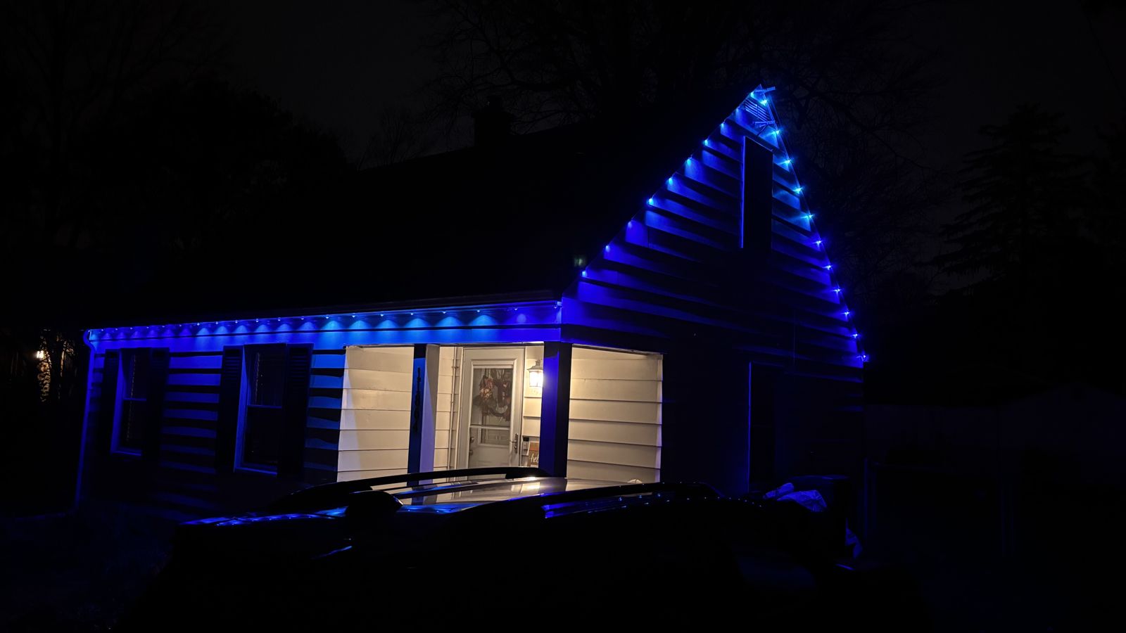 Same house lit in blue